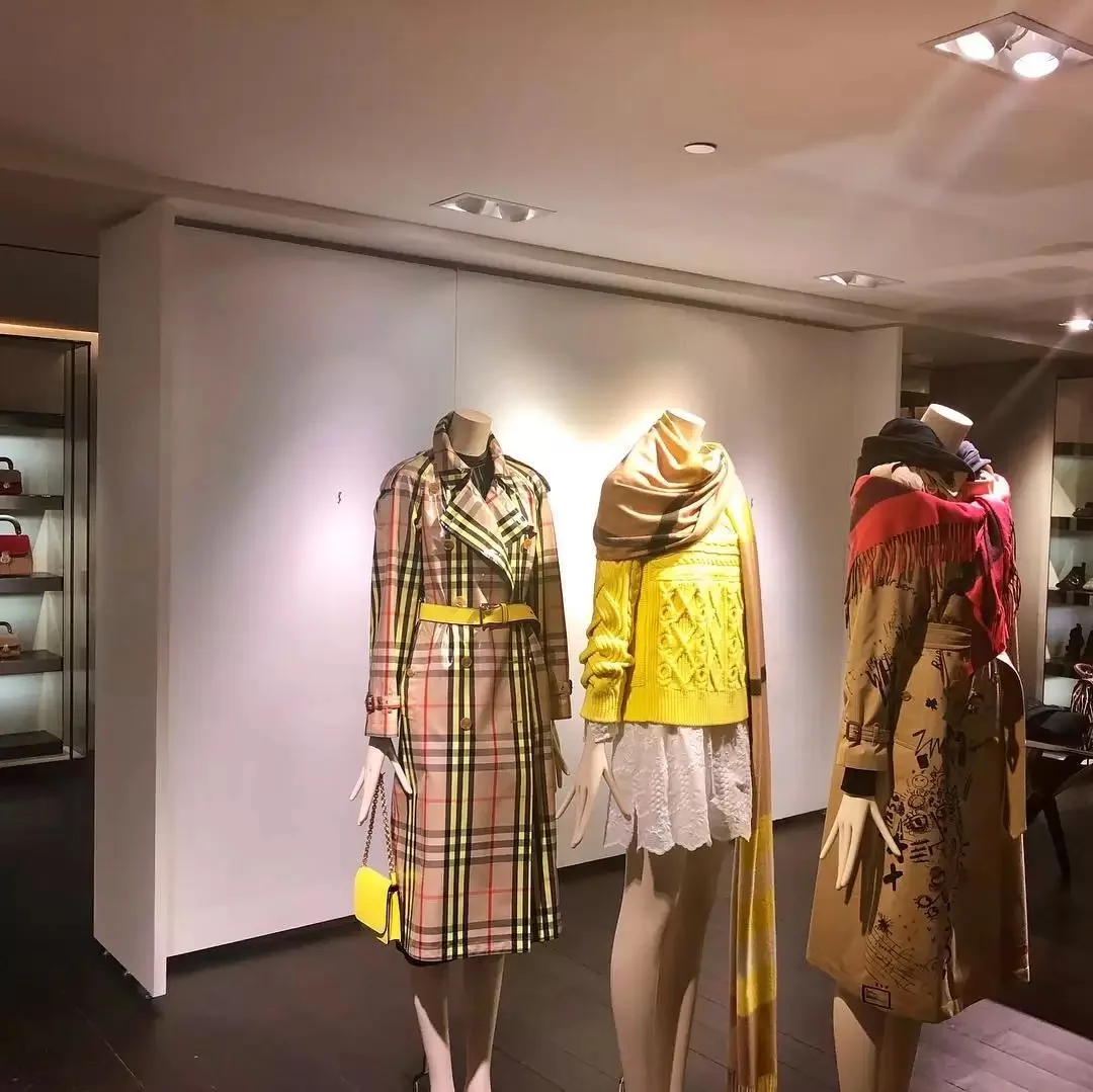 Freestanding display wall on the retail floor at Burberry in NYC