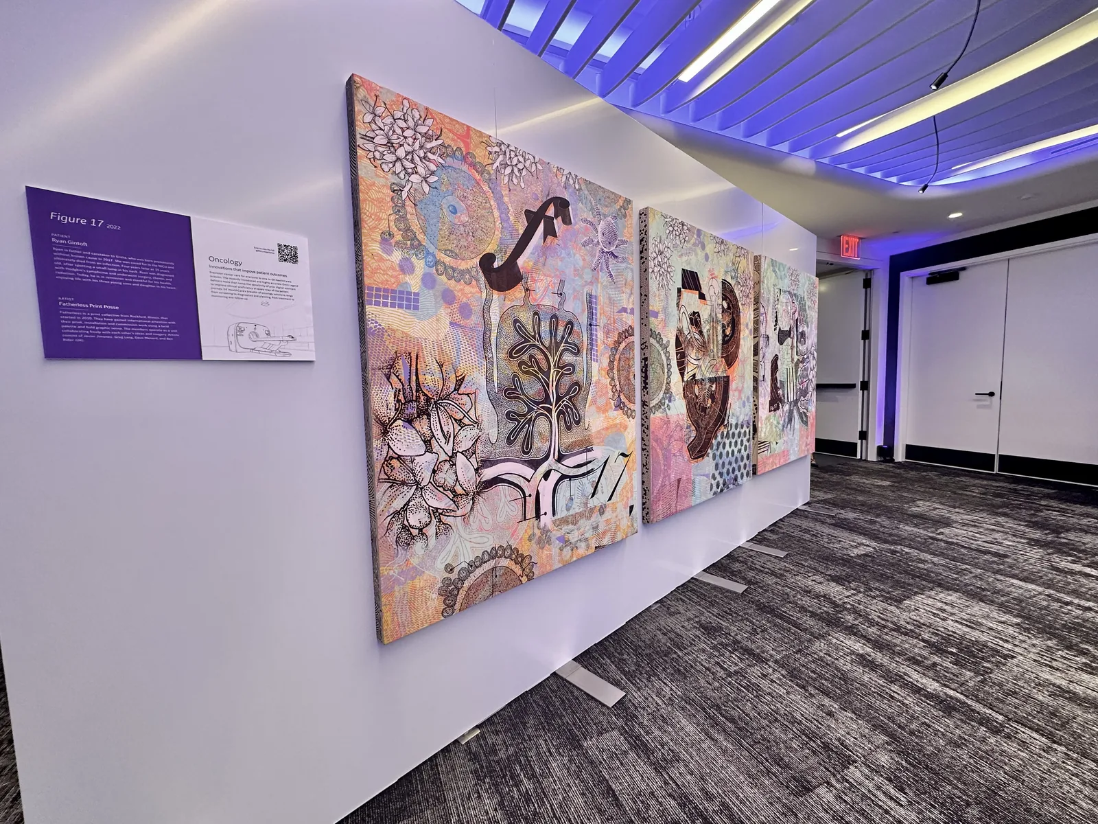 Freestanding display walls at a corporate art showcase
